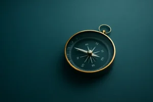 Compass on Teal Mist Background – Values Hero Image