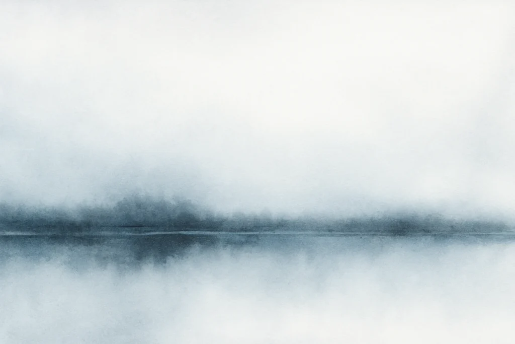 Abstract soft blue-grey watercolor horizon with subtle reflection, symbolising quiet self-recognition and emerging clarity towards life purpose.