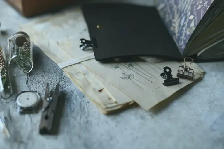 Open journal and handwritten pages symbolising intergenerational quantum journeys and inherited patterns.